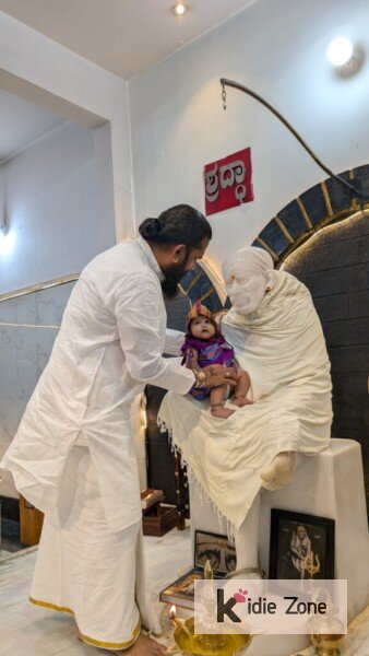 Nivisha with Sai Baba